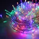 ^ 300 LED НИЗ СВЕТЛИНИ (НА 5 см), МНОГОЦВЕТЕН, АДАПТЕР (31VDC) & 8 ФУНКЦИИ, IP44, 15 м, TRAN / NT КАБЕЛ