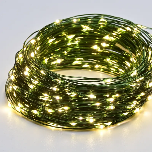 100 LED СТРУННИ СВЕТЛИНИ, WW, ЗЕЛЕН МЕДЕН ПРОВОД, АДАПТЕР (3,5VDC) И 8 ФУНКЦИИ, IP44, 10M+3M, 600mA